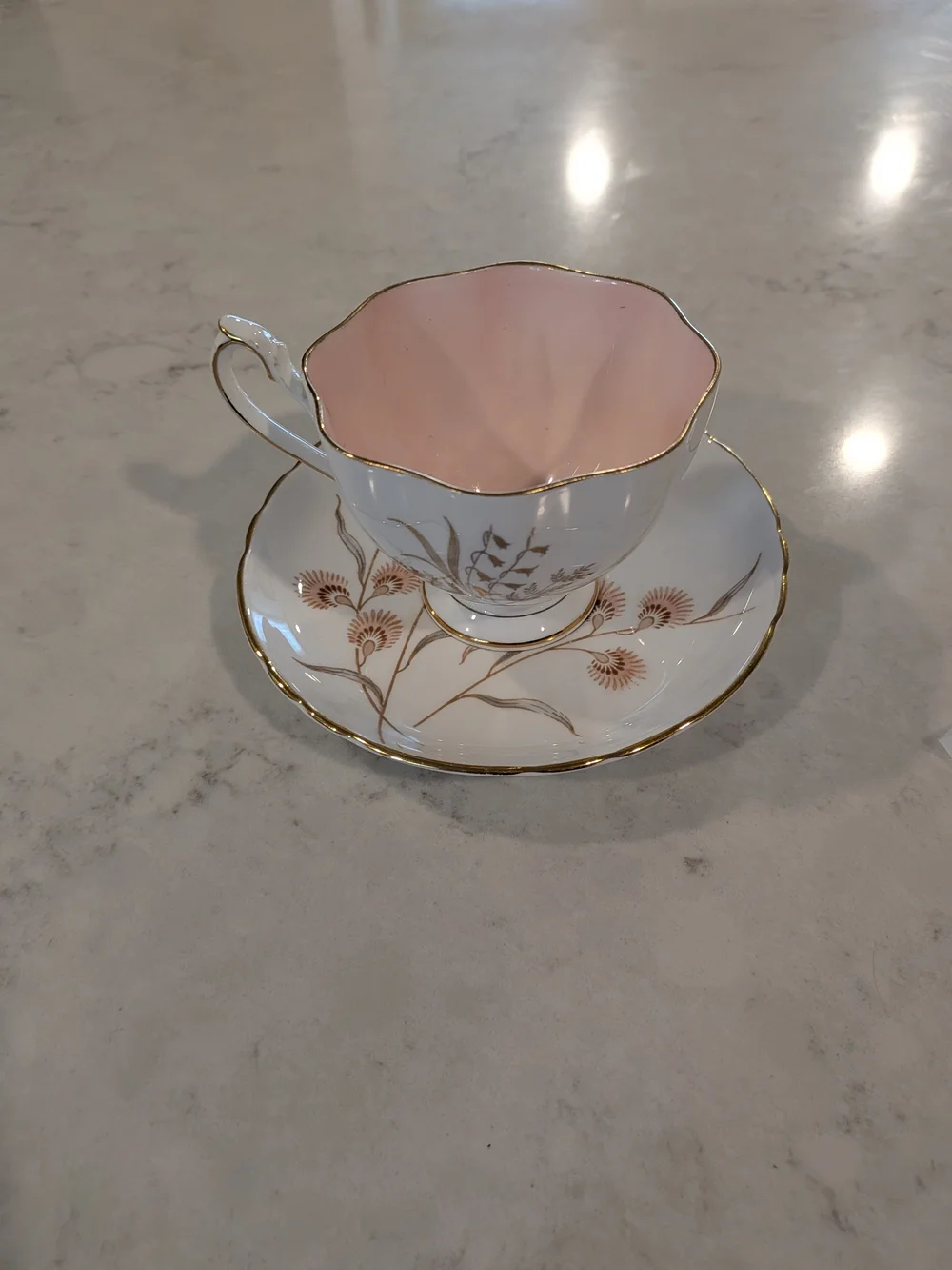 Pink Interior Porcelain Teacup and Saucer with Gold Floral Trim Differen Maker
